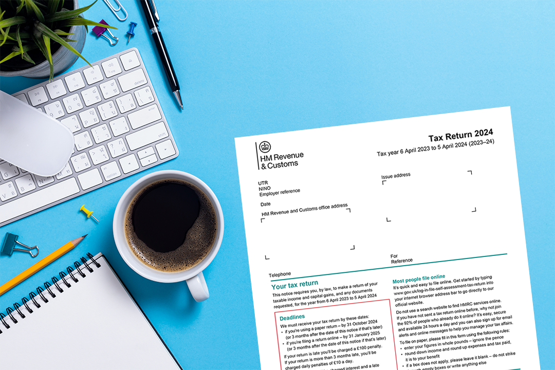 Desk with a paper tax return lying on it