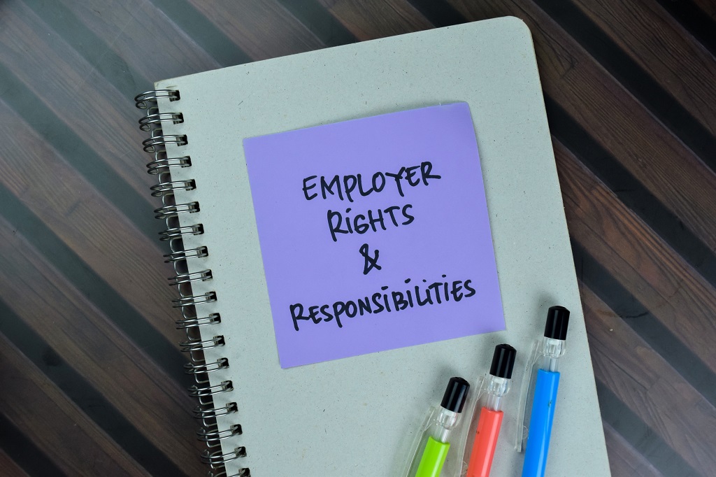 Notebook showing Employer Rights &amp; Responsibilities text